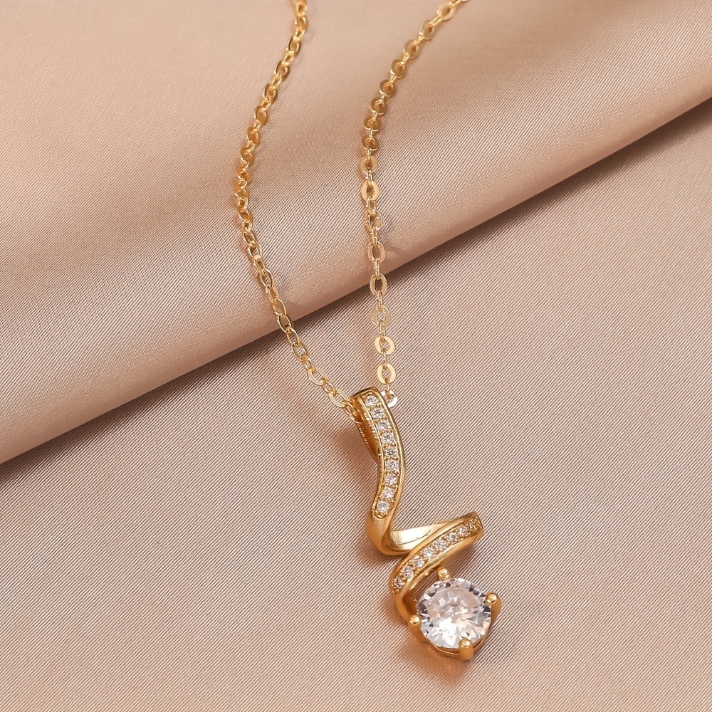Exquisite 18K Gold-Plated Zircon Pendant: Elegant Rotating Design - Picture 3 of 6